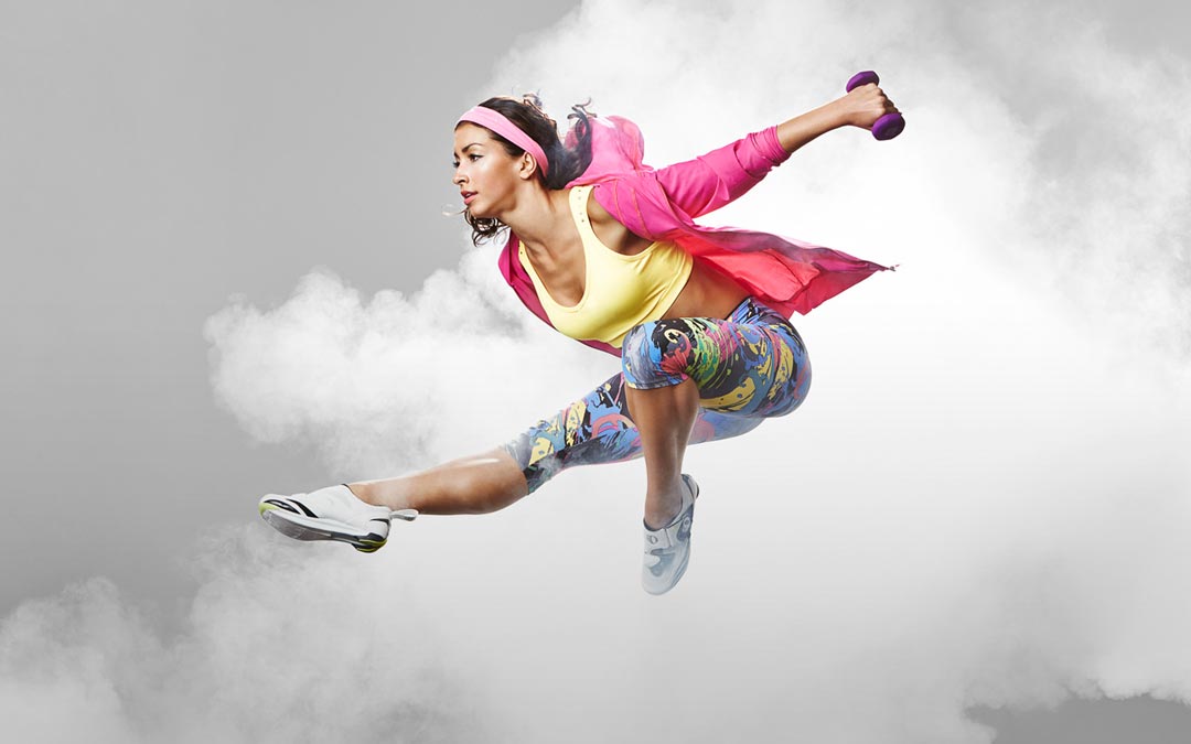 An athlete leaps in the clouds